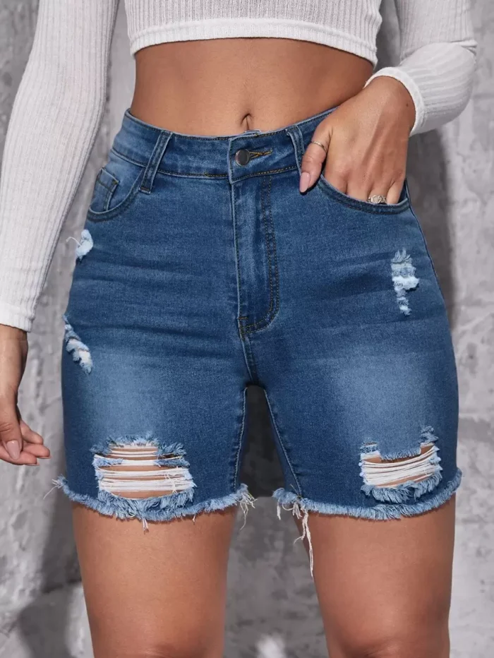 SHEIN Essnce Ripped Raw Hem Denim Shorts