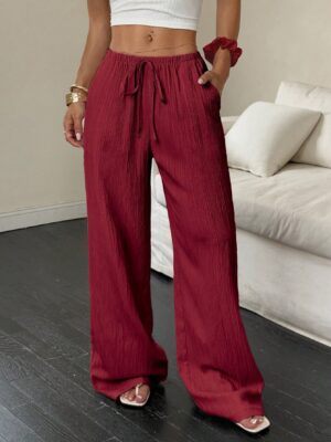 Flirla Women's Casual Solid Color Textured Fabric Knotted Waist Slant Pocket Wide Leg Pants Fall Cloth