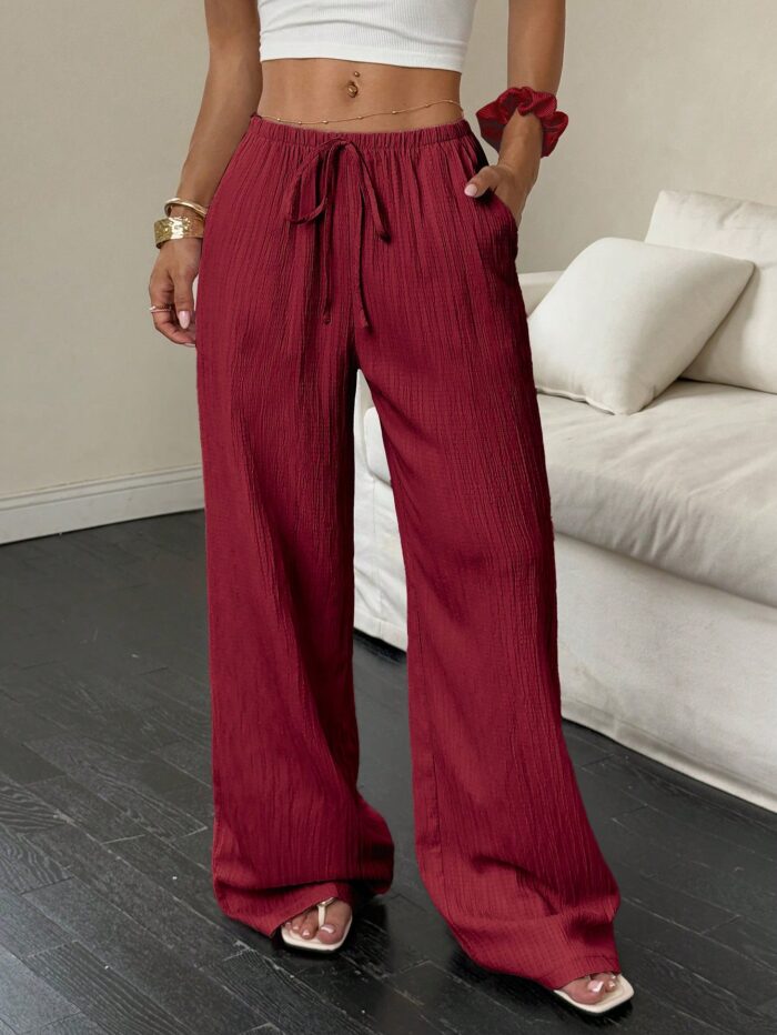 Flirla Women's Casual Solid Color Textured Fabric Knotted Waist Slant Pocket Wide Leg Pants Fall Cloth