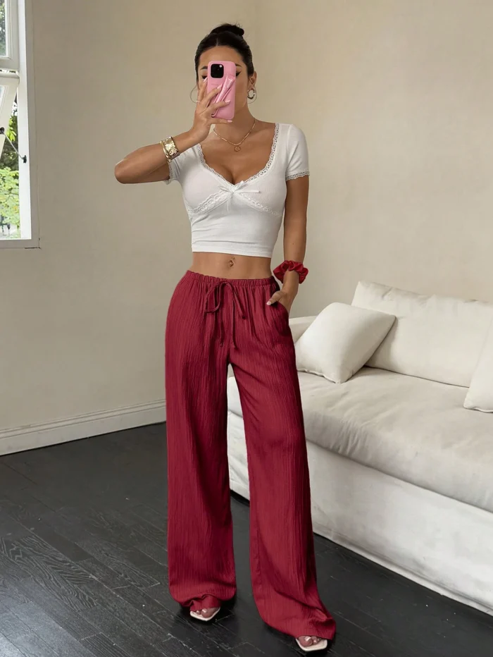 Flirla Women's Casual Solid Color Textured Fabric Knotted Waist Slant Pocket Wide Leg Pants Fall Cloth - Image 5