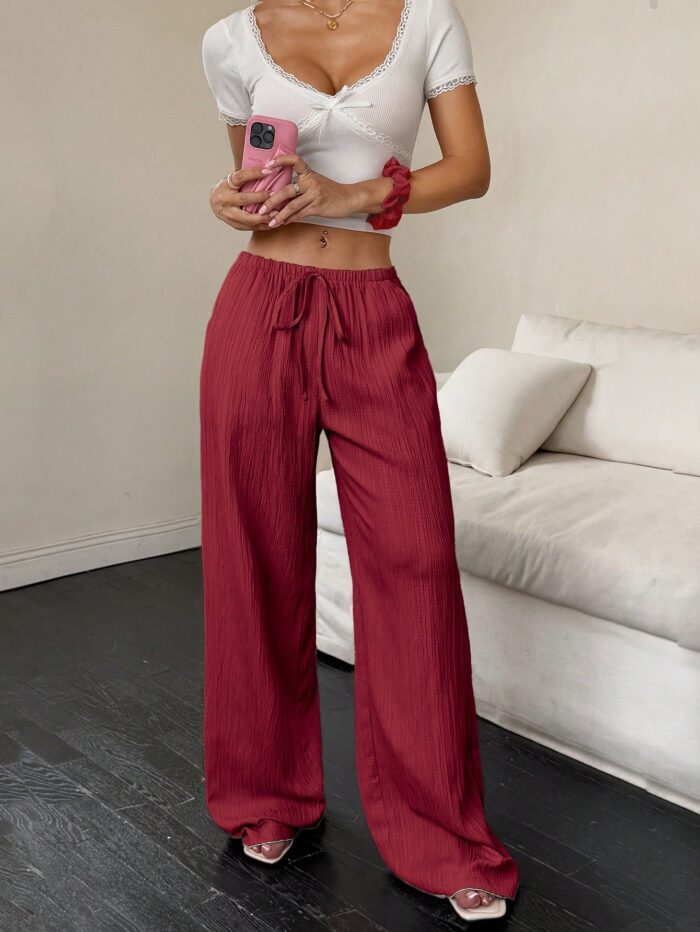 Flirla Women's Casual Solid Color Textured Fabric Knotted Waist Slant Pocket Wide Leg Pants Fall Cloth - Image 6